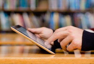 Student hands holding tablet computer American Sound & Electronics Classroom Technology in Cincinnati OH