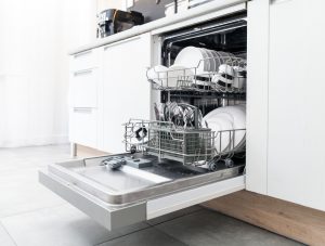 Open dishwasher filled with dishes